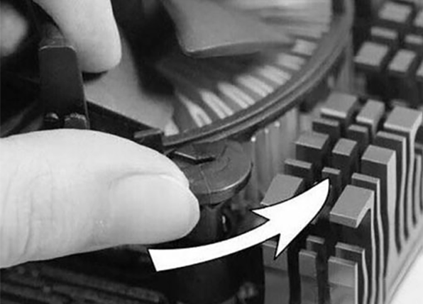 turn the knobs 90 degrees counterclockwise to take out the Intel CPU cooler